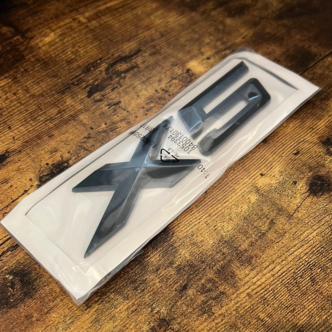 BMW badge replacement